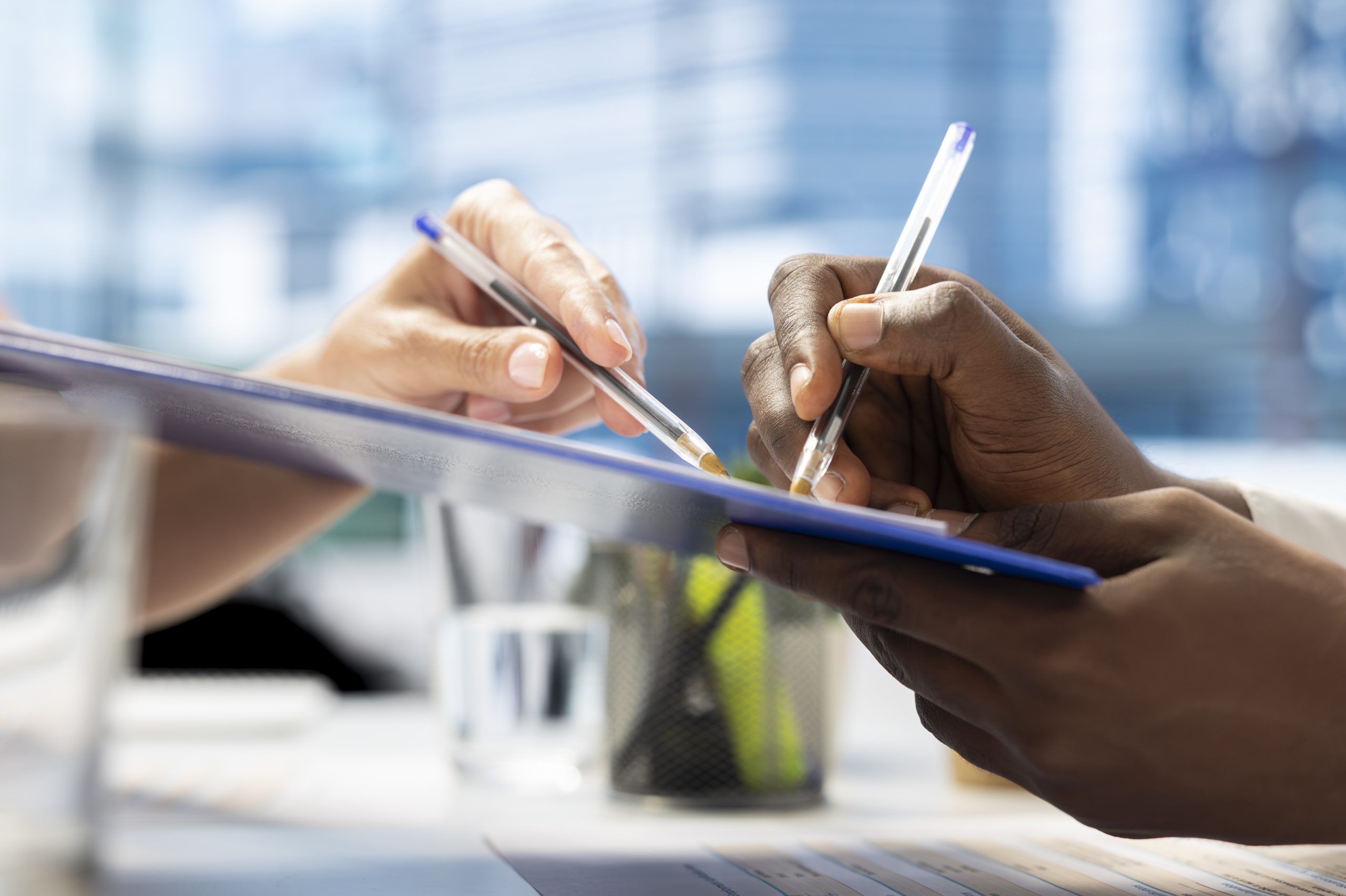 Professional reviewing and signing formal documentation