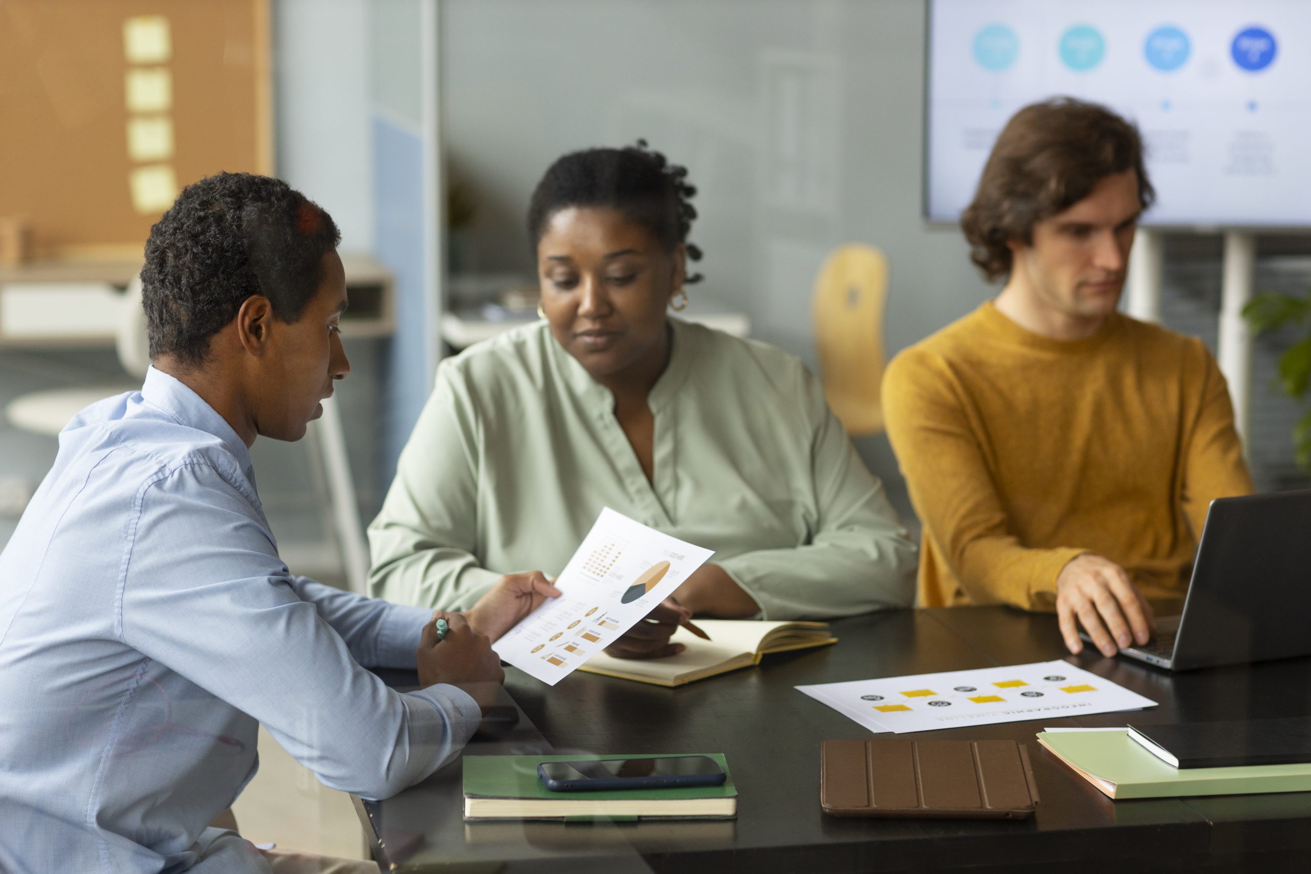 Colleagues collaborating in an office environment